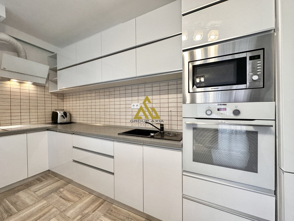 Inchiriere Apartament 3 camere, 2 bai, zona centrala, garaj